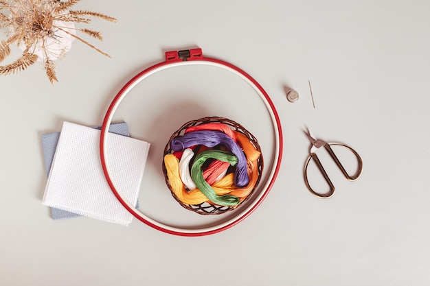 Happy crafter showing embroidery